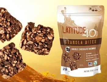 Double Chocolate Brownie granola bites bag with 4 bites and a mountain background